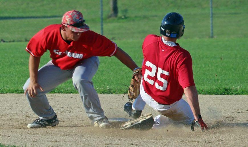 Close Play - Seaboard shortstop Mitchell Rogers tags out Chance Carney of Natural Baseball Academy July 5 at Mid-America Sports Complex in Shawnee, KS.